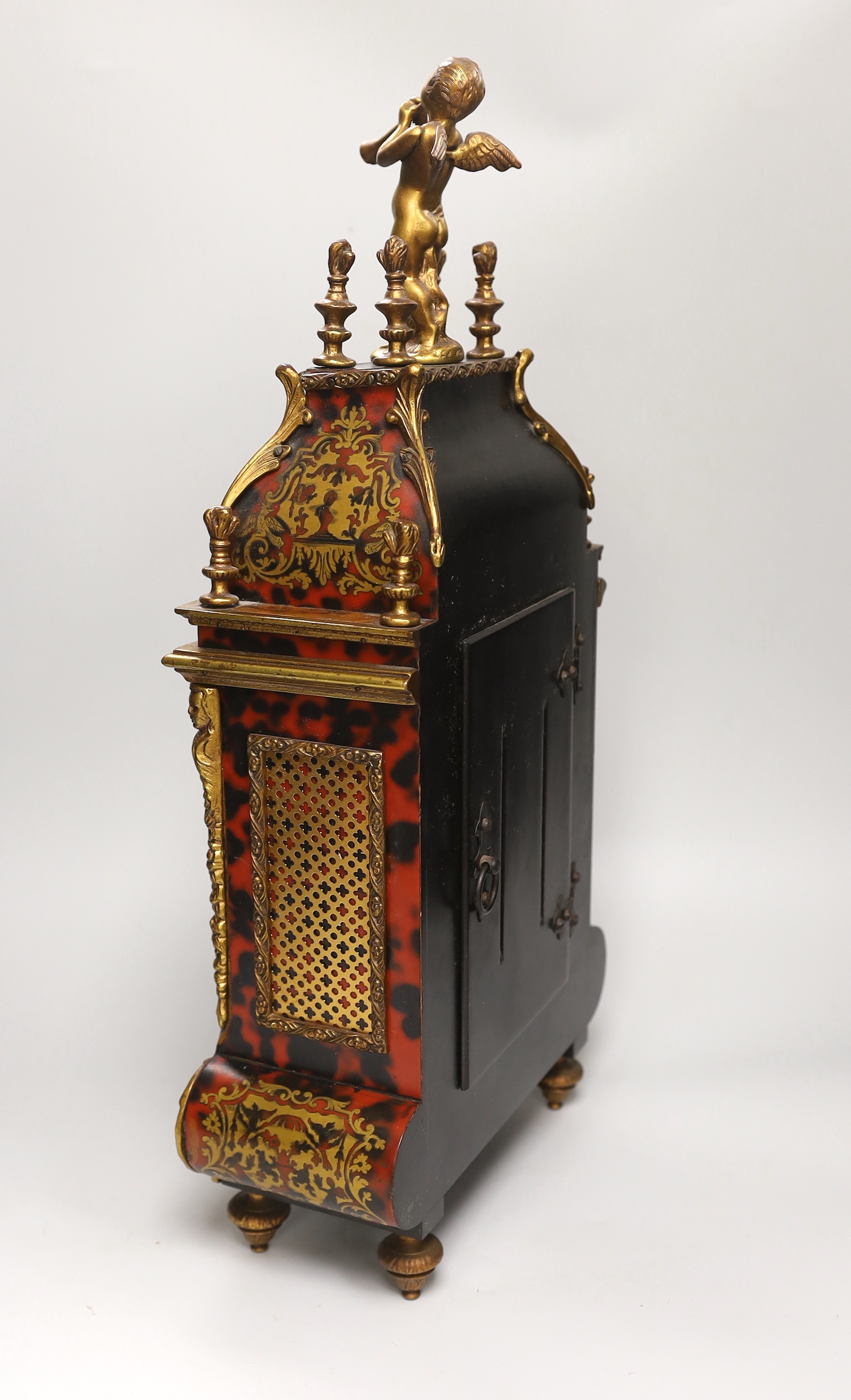 A reproduction boullework mantel clock in period style, 56cm
